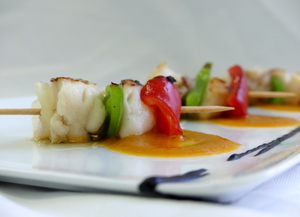Monkfish and scallop skewer with seafood sauce