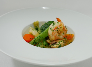 Artichokes and prawns warm salad with a mix of vegetables