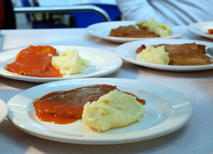 Simmered and buttered veal with biscayne sauce and mashed potatoes