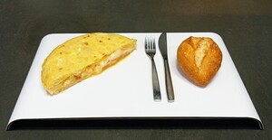 Potato omelette with ham and cheese