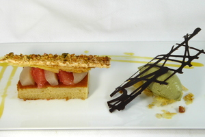 Grapefruit and pear financier sponge cake with dried fruit puff-pastry and pistachio ice cream