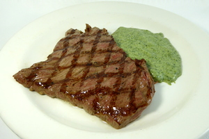 Grilled veal steak with muslin spinach