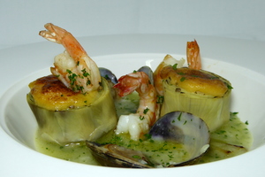 Gratin of artichokes filled with mushrooms and prawns