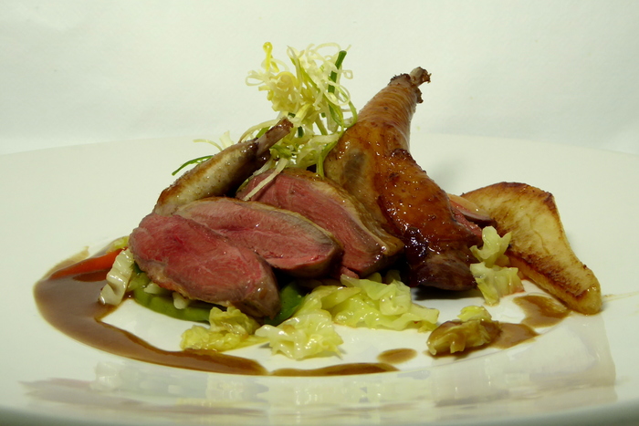 Roasted squab with collard greens