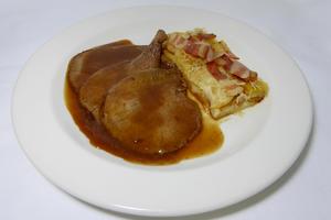 Roasted veal with gratin potatoes millefeuille