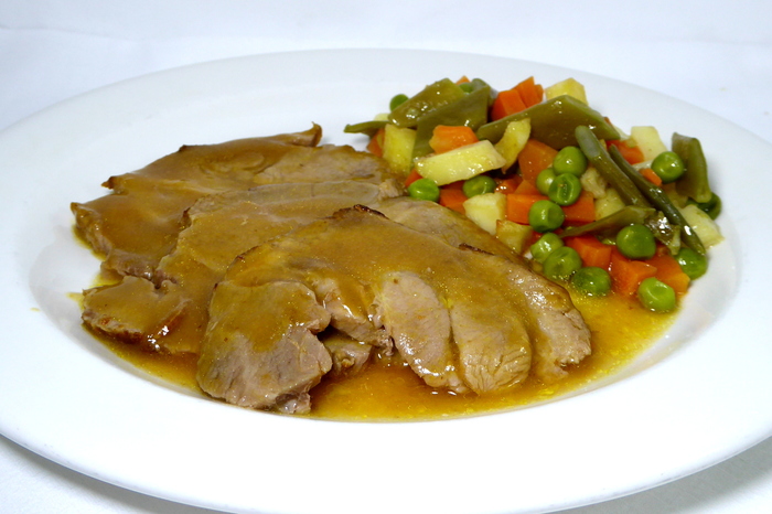 Braised pork loin with mix of vegetables