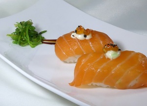 Tuna or salmon nigiri sushi