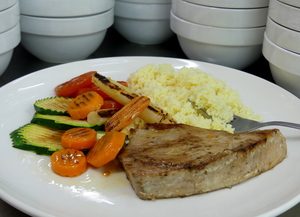 Grilled tuna steak with grilled vegetables and couscous