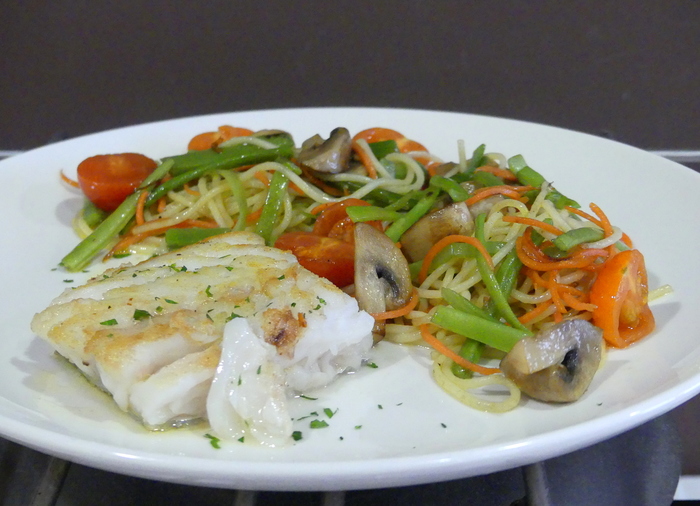 Grilled hake with pasta and vegetable wok