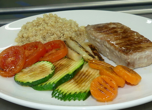Grilled tuna steak with grilled vegetables and quinoa